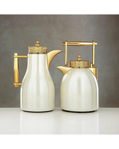 A set of pearl shaped thermos with a golden handle