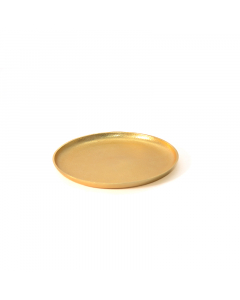 A medium golden round serving plate