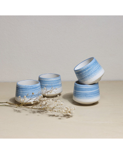 A set of 4 blue porcelain cups