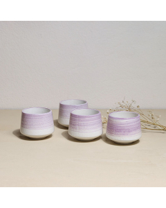 A set of 4 pink porcelain cups