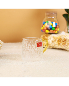 Glass mug with golden handle
