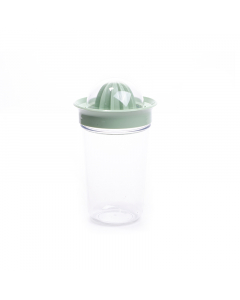 Plastic juicer with a green cover