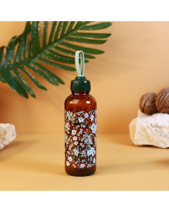 Decorative water bottle with green plastic cap